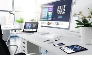 Meeras Tech offers the best web design services in UAE with responsive layouts shown on multiple devices in a modern office.